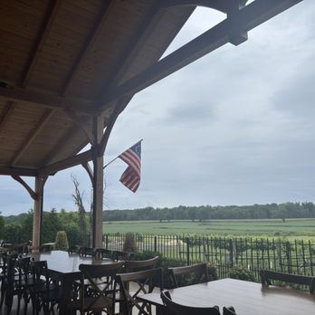 Iron Plow Vineyards - Siting on the patio overlooking the vinards - Wineries Near Me - Mansfield, New Jersey Iron Plow Vineyards - Siting on the patio overlooking the vinards - Wineries Near Me - Mansfield, New Jersey