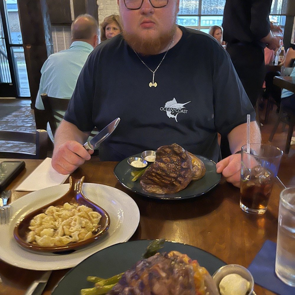 Husband was so excited to eat! Yummy ribeye and truffle Mac and cheese!