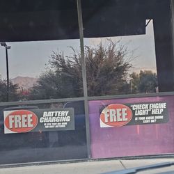 AutoZone Auto Parts - Some of the services offered, according to the window signs
