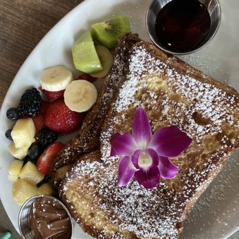 Bistro Cafe - French toast 'Tostadas Francesas' Nutella on the side and fresh fruit - Breakfast & Brunch Near Me - Miami, Florida Bistro Cafe - French toast 'Tostadas Francesas' Nutella on the side and fresh fruit - Breakfast & Brunch Near Me - Miami, Florida