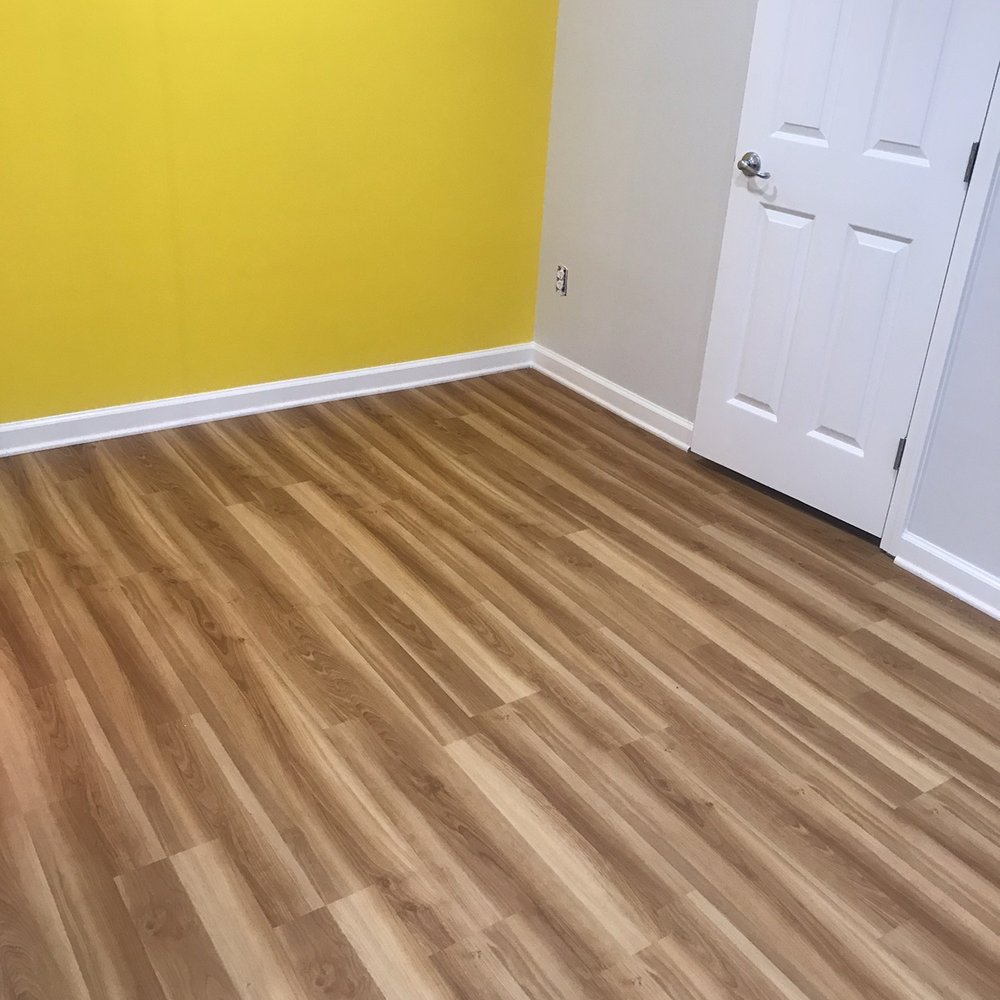 J&E Contracting - Basement paint and new flooring - Painters Near Me