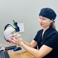 Cedar Park Dental Wellness - Dr.Regina's surprised look at the perfection of his teeth!