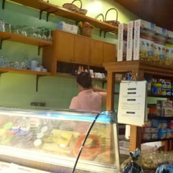 The Market - Ice cream counter and dry goods shelves.