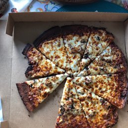 Burnt incomplete pizza Burnt incomplete pizza