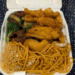 China Wok Express - Two item combo, half and half, spicy fish and broccoli beef. They feel it so full that couldn't even close it.
