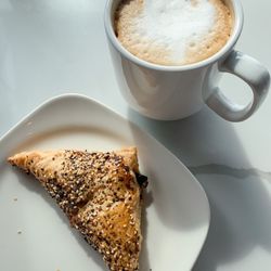 Riverfront Bakery - Everything Seasoning Turnover and Cappuccino