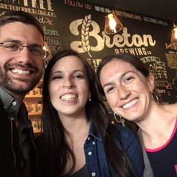 three people posing for a picture