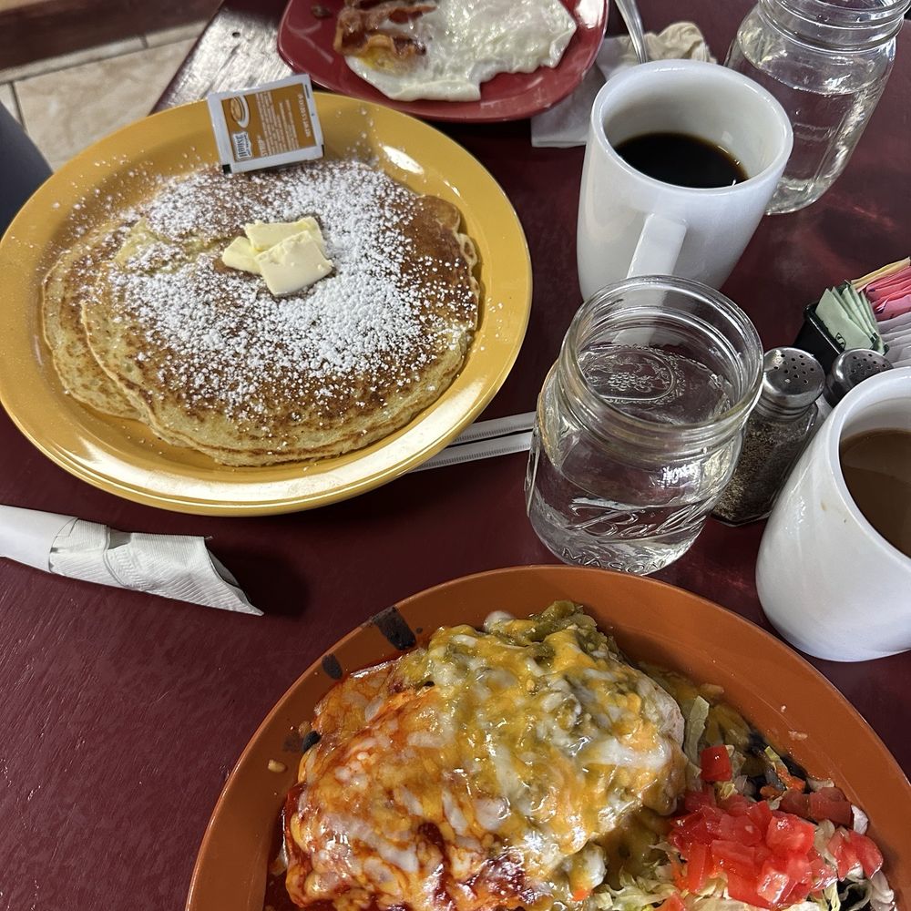 Sagche's Coffee House - Brunch - smothered breakfast burrito with black beans and pancakes with bacon and eggs. - Breakfast & Brunch Near Me - Santa Fe, New Mexico Sagche's Coffee House - Brunch - smothered breakfast burrito with black beans and pancakes with bacon and eggs. - Breakfast & Brunch Near Me - Santa Fe, New Mexico