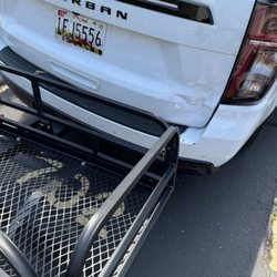 International Collision Center - Damage to the rear door from the accident