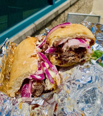 Photo of Si Señor Peruvian Sandwiches and More - Columbus, OH, US. Chicharron Peruano Sandwich