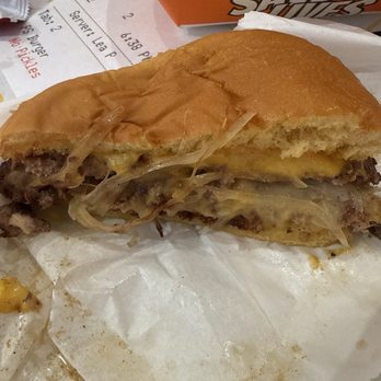 Proudly Serving - PS burger cut in half - Burgers Near Me - Long Beach, California