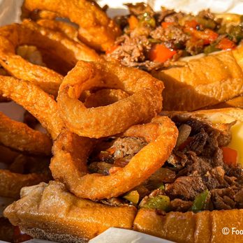 Zac's Philly Steaks and Shakes - Philly Cheesesteak with Onion Rings - Cheesesteaks Near Me - Lancaster, Texas Zac's Philly Steaks and Shakes - Philly Cheesesteak with Onion Rings - Cheesesteaks Near Me - Lancaster, Texas