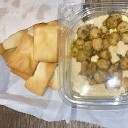 Pita chips, hummus, and chickpeas Pita chips, hummus, and chickpeas