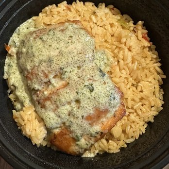 Ralphie's Crossroads Cafe - Grilled Salmon w/ Creamy Pesto Sauce over Rice - Hot Dogs Near Me - Plainview, New York Ralphie's Crossroads Cafe - Grilled Salmon w/ Creamy Pesto Sauce over Rice - Hot Dogs Near Me - Plainview, New York