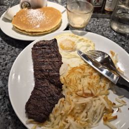 Steak and eggs with a side of pancakes