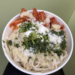 The Cheese Wheel - Fettuccine with pesto and dried tomatoes, added garlic and parm. Warm and cheesy. Large enough to split. £11