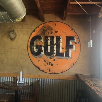 J B's - a rusty gulf sign on the wall - American Near Me - Hughes Springs, Texas J B's - a rusty gulf sign on the wall - American Near Me - Hughes Springs, Texas