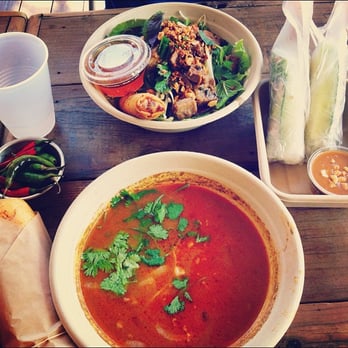 East Borough - Some of the amazing beef stew, some spring rolls, and a plate of vermicelli with grilled pork - Vietnamese Near Me - Costa Mesa, California
