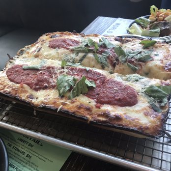 Cartridge Brewing - Detroit style cheese pizza with basil. - Breweries Near Me - Maineville, Ohio