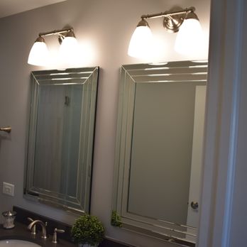 Pro V Remodeling - two mirrors in a bathroom - General Contractors Near Me