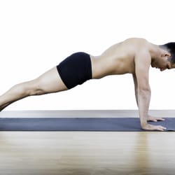 C Fitness Studio - Oscar in a Yoga pose