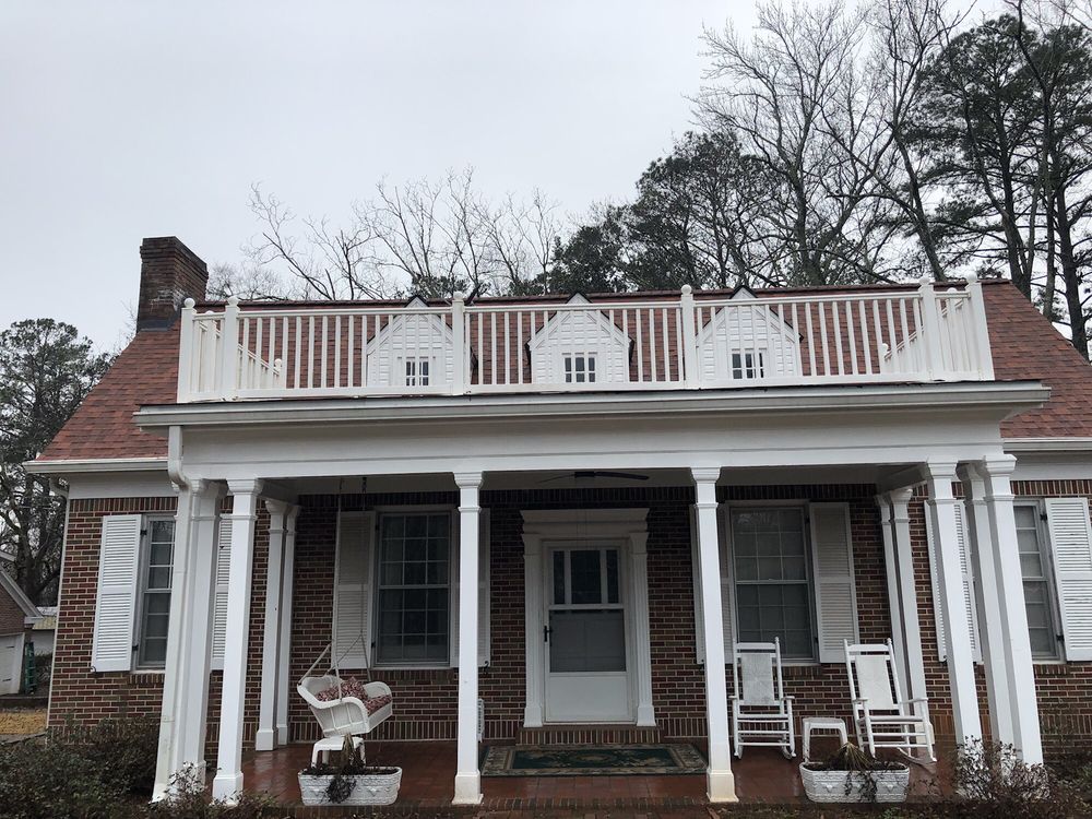 Slide of Rainblocker Roofing & Construction