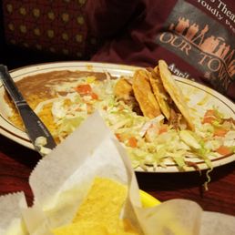 Tacos with rice and beans (he forgot to ask for no veggies so they are out of the taco)
