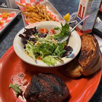 Spinns Burger & Beer - Sirloin steak dinner with house salad and some delicious seasoned fries. - American Near Me - Albuquerque, New Mexico