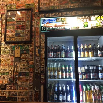 NJ's - a display of beer bottles in a bar - Dive Bars Near Me - Houston, Texas NJ's - a display of beer bottles in a bar - Dive Bars Near Me - Houston, Texas