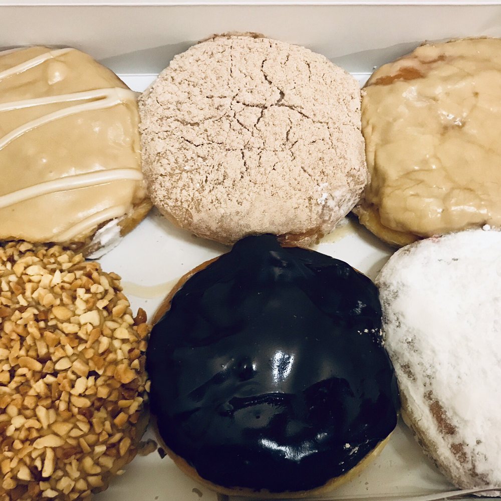 A box of the "day old" donuts. So delicious! A box of the "day old" donuts. So delicious!