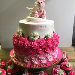 Baby shower rosette cake and cupcakes
