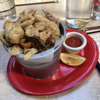 Numero 28 - Fried calamari and zucchini with marina dipping sauce - Italian Near Me - Austin, Texas Numero 28 - Fried calamari and zucchini with marina dipping sauce - Italian Near Me - Austin, Texas