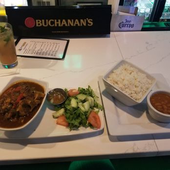 Zona Caribbean - Oxtail w/ salad, rice & beans - Caribbean Near Me - Norcross, Georgia Zona Caribbean - Oxtail w/ salad, rice & beans - Caribbean Near Me - Norcross, Georgia