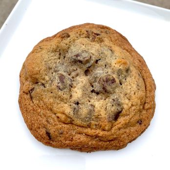 Sticky Fingers Cafe - a chocolate chip cookie on a square plate - Bakeries Near Me - Lago Vista, Texas Sticky Fingers Cafe - a chocolate chip cookie on a square plate - Bakeries Near Me - Lago Vista, Texas