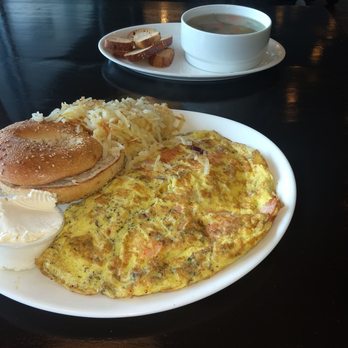 Emma's Bagel Cafe - Lox omolette with extra lox (salmon and extra egg) hashbrowns and sesame seed bagel and cream cheese - Breakfast & Brunch Near Me - Skokie, Illinois