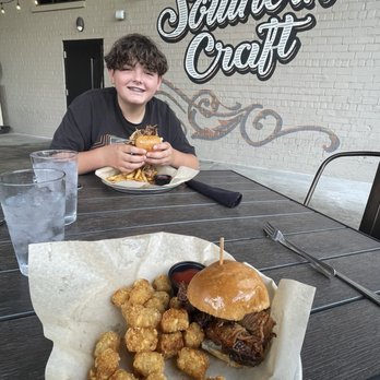 Southern Craft BBQ - Outdoor dining. Burnt ends sandwich with tater tots. Pulled pork sandwich with French fries. - Barbeque Near Me - Bristol, Virginia Southern Craft BBQ - Outdoor dining. Burnt ends sandwich with tater tots. Pulled pork sandwich with French fries. - Barbeque Near Me - Bristol, Virginia