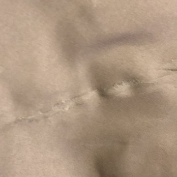 Classic Touch Dry Cleaners - Damaged Comforter - Dry Cleaning Near Me - Clearwater, Florida