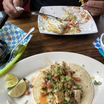 La Cabana de Raya - One chicken taco. I ate the other two before realizing I didn't take a photo!  Other plate is an empanada. - Mexican Near Me - Astoria, Oregon