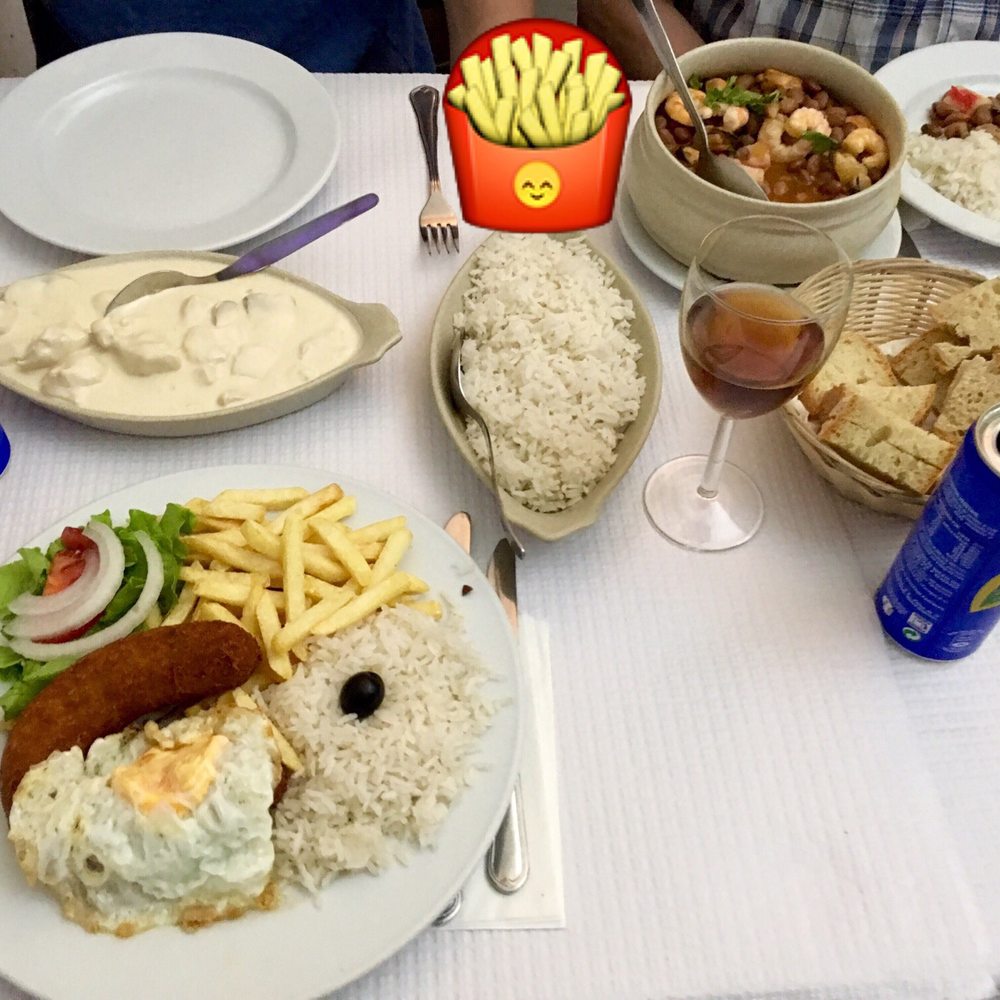 Santa Rita - Most food comes with rice and fries. Chicken with cheese sauce, cup of seafood and alheira. (Fries were missing in this photo) - Portuguese Near Me - Lisbon, 11 Santa Rita - Most food comes with rice and fries. Chicken with cheese sauce, cup of seafood and alheira. (Fries were missing in this photo) - Portuguese Near Me - Lisbon, 11