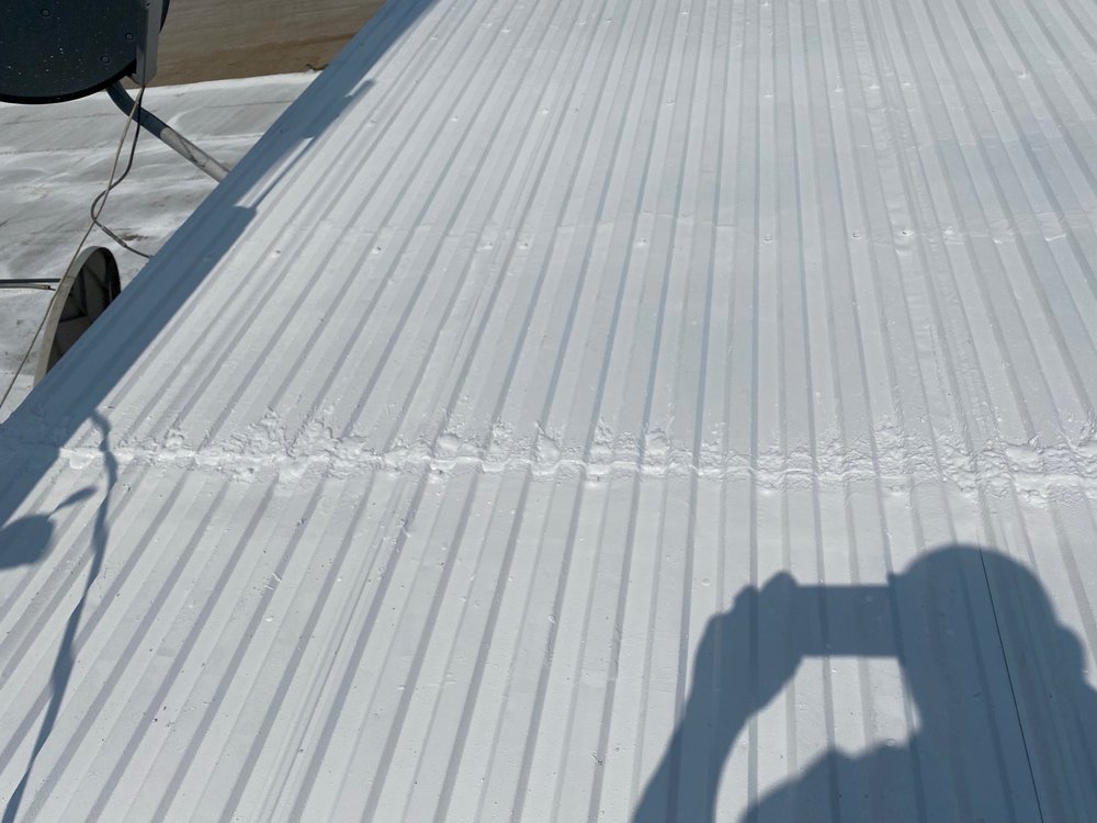 Slide of Rock Solid Roofing & Coatings