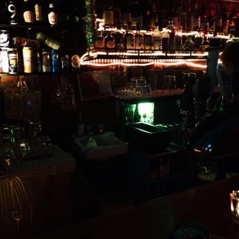 Black Dice Cafe - a man sitting at a bar - Bars Near Me - Toronto, Ontario Black Dice Cafe - a man sitting at a bar - Bars Near Me - Toronto, Ontario
