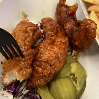 Hot Chicken - Disgustingly salty and over fried chicken strips. Had no reason to be on pickles from a can or lettuce etc - Chicken Shop Near Me - Elk Grove, California