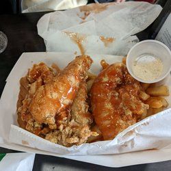 Harolds Fried Chicken - Chicken tenders with some mild sauce. Had to pay for more to go.