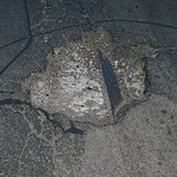 Milwaukee Potholes - photo by compujeramey