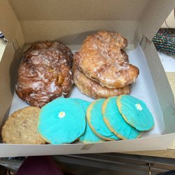 New System Bakery - Apple fritters iced sugar cookies crescent doughnuts