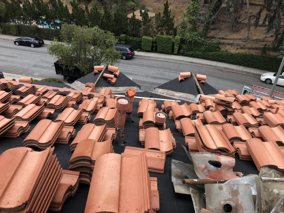 Slide of Frank Delgado Roofing