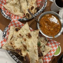 Guru India Restaurant - Naan plain and garlic, butter chicken