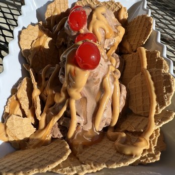 Insane Conez - Ice cream nachos w/Chocolate PB & Chocolate Brownie ice cream. Layered w/ PB & Caramel sauces with cherries on top - Candy Stores Near Me - Port Charlotte, Florida Insane Conez - Ice cream nachos w/Chocolate PB & Chocolate Brownie ice cream. Layered w/ PB & Caramel sauces with cherries on top - Candy Stores Near Me - Port Charlotte, Florida