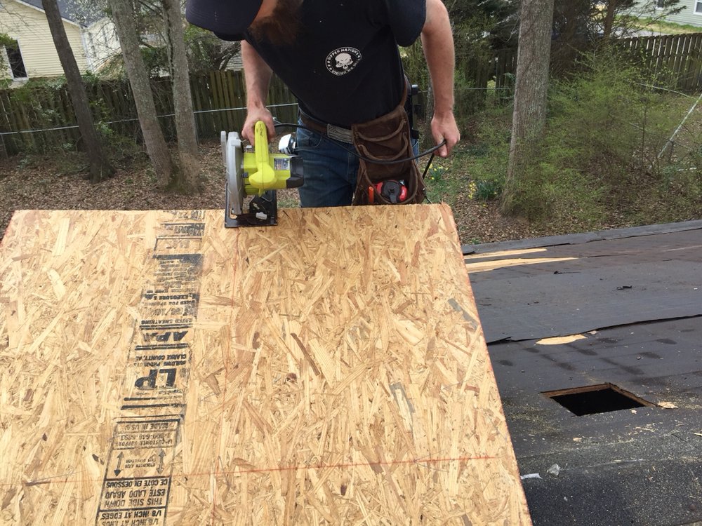 Slide of Carey's Roofing