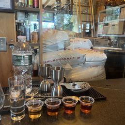 Flight of the brandy, Rye whiskey, barley bourbon, and wheated bourbon.